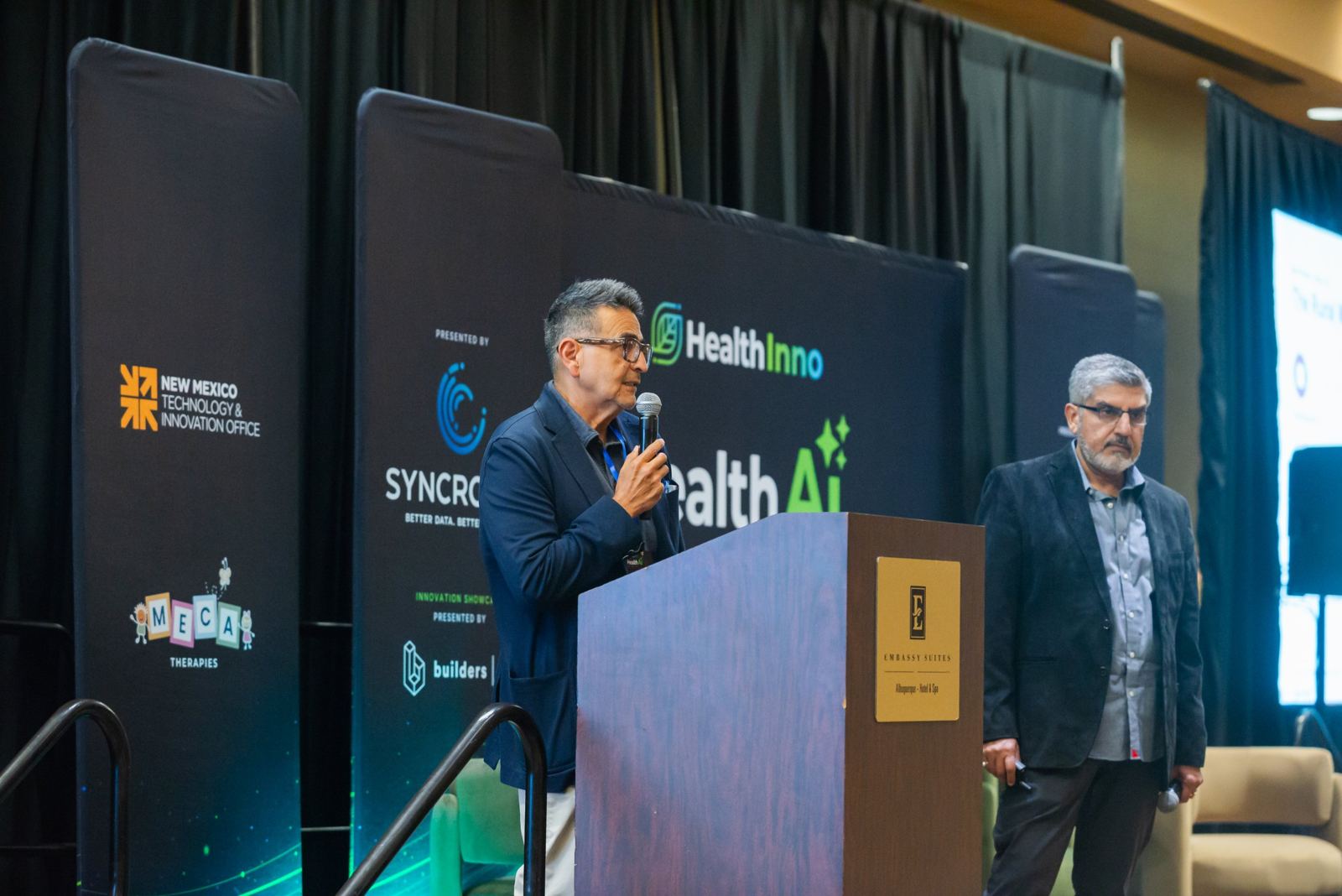 Vineet Gulati and Dr. Jesus Saucedo, WeaveIn, presenting at HealthAI 2026