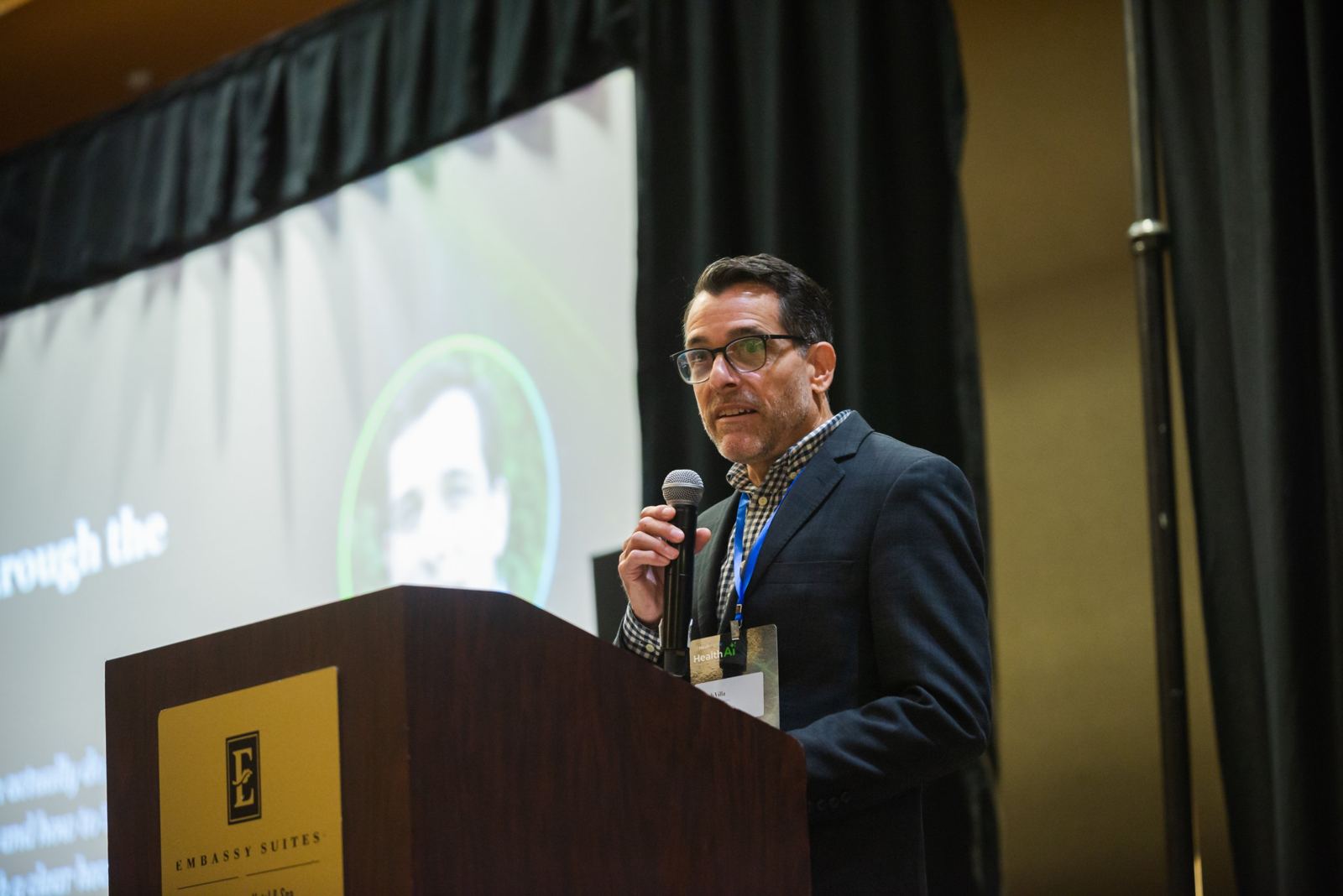 Joseph Villa speaking at HealthAI 2026